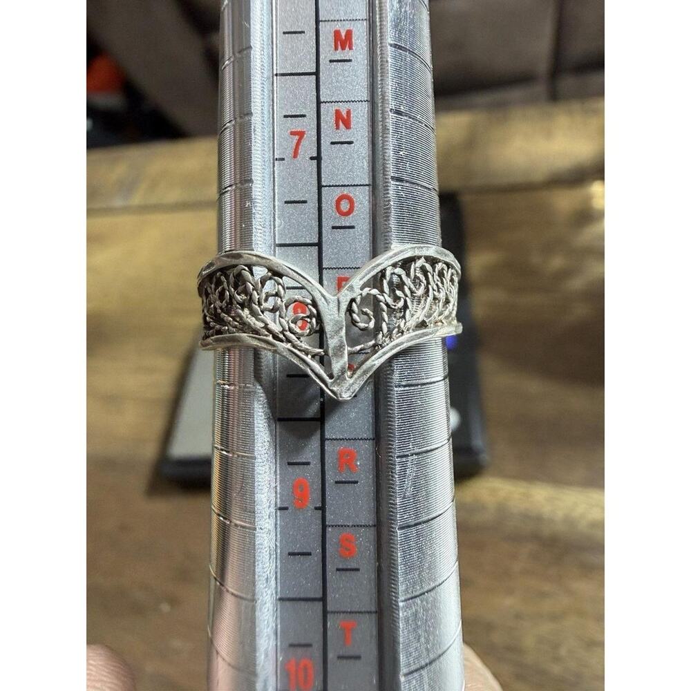 This vintage sterling silver filigree